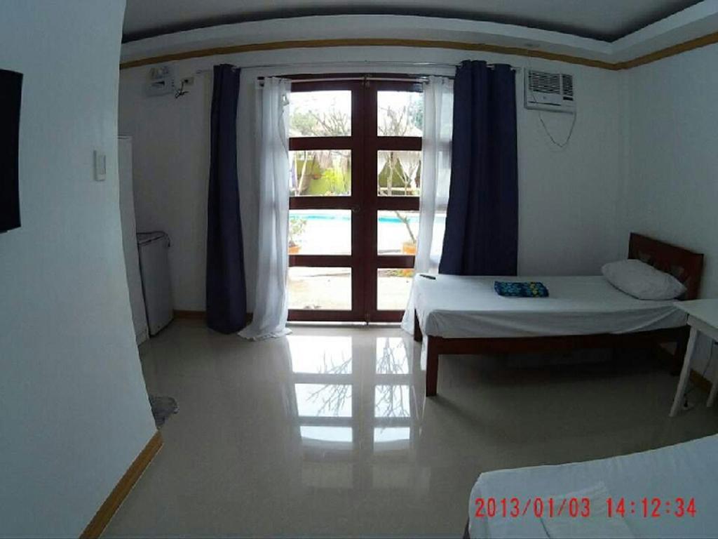 Oyo 644 Flower Garden Puerto Princesa Room photo